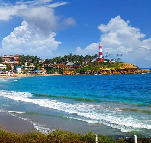 visit kovalam beach in taxi. book taxi with marari taxi service
